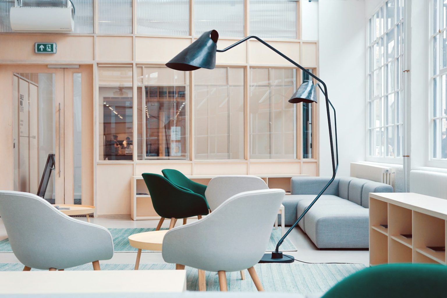 Photo by Toa Heftiba black floor lamp on living room sofa