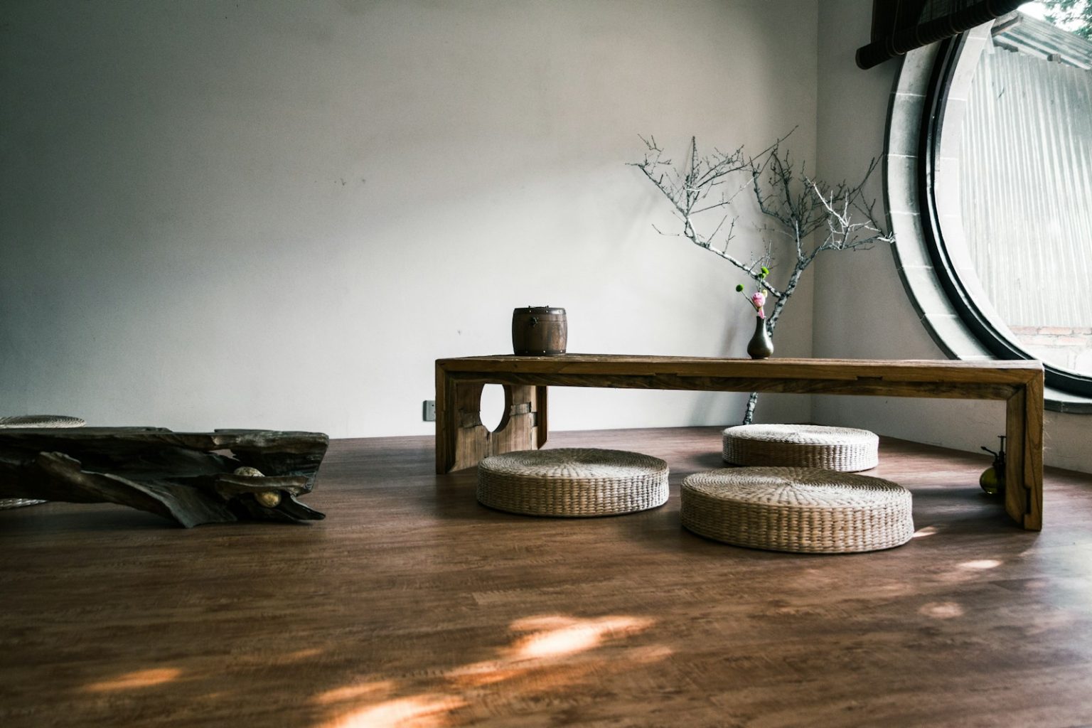 Photo by Daniel Chen brown wooden bench near window